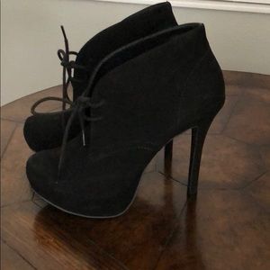 Gently used ankle high heel booties